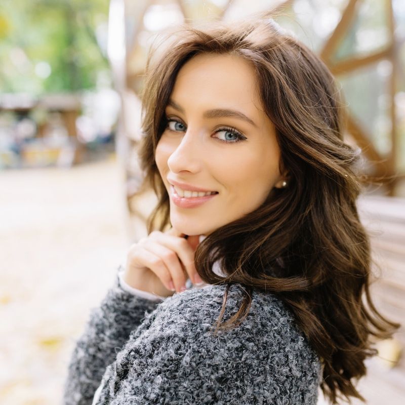 white woman smiling